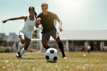 Obraz na płótnie Canvas Friends, soccer player and soccer training game on football field for fitness workout on grass outdoor football pitch for body or cardiovascular health. People, soccer ball and summer run in Brazil