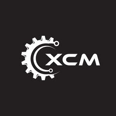 XCM letter technology logo design on black background. XCM creative initials letter IT logo concept. XCM setting shape design.
