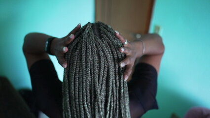 A black latina girl with box braids hairstyle
