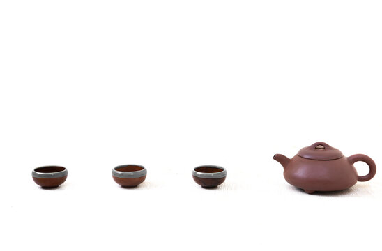 tea set view, Chinese teapot, cups on a white background