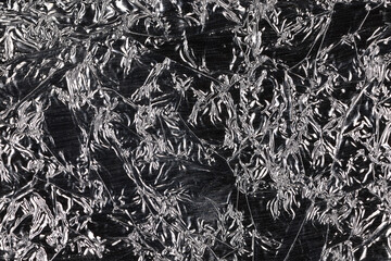 crumpled foil abstract background black and white silver effect