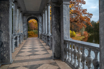 Marble bridge in the autumn park in the city of Pushkin near St. Petersburg
