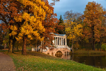 Marble bridge in the autumn park in the city of Pushkin near St. Petersburg