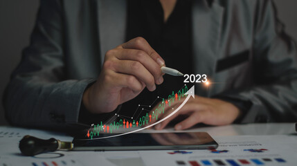 Digital marketing 2023 goals. Businessman analyzing internet marketing online, 2023 business planning, business skyrocket, online stock market analysis, stock chart next year, digital stock trading