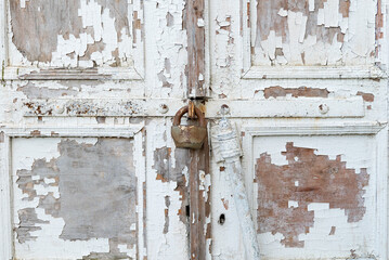 closed wooden door with lock