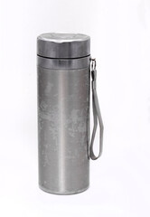 metal thermos on a white background