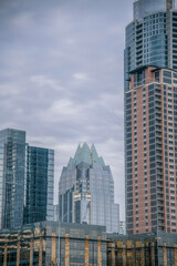 Fototapeta na wymiar Austin, Texas- Skyscraper buildings against the cloudy sky views from Butler Metro Park