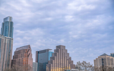 Fototapeta na wymiar Austin, Texas- Cityscape against the cloudy sky views from Butler Metro Park