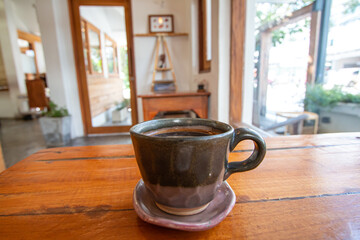 Coffee and a beautiful mug go well with good taste.