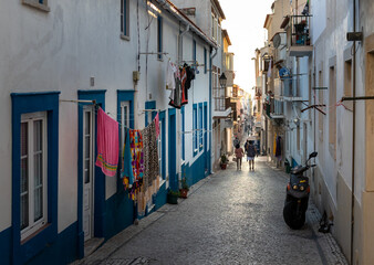 Fototapeta na wymiar Portugal, August 2022: Street of a traditional village in Portugal, Nazaré