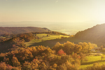 Hilly rural landscape in autumn season.