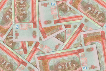 Paper money from Guatemala. Guatemalan quetzal. Close up banknotes from Guatemala. Guatemalan currency 