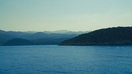 Incredible landscape of the mountains rising above the sea.