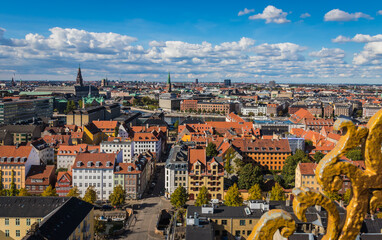 Fototapeta na wymiar Rooftop view Copenhagen with cloudy skies