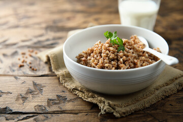 Traditional homemade buckwheat porridge in a white bowl