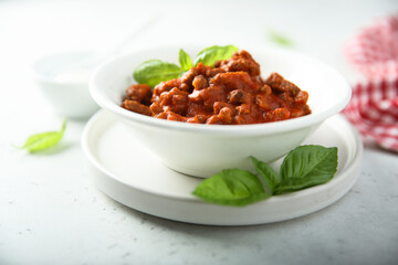 Homemade Bolognese sauce with fresh basil
