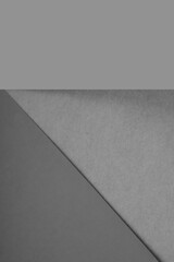 Dark and light, Plain and Textured Shades of grey papers background lines intersecting to form a triangle shape