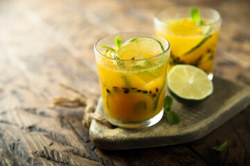Refreshing passion fruit cocktail with lime