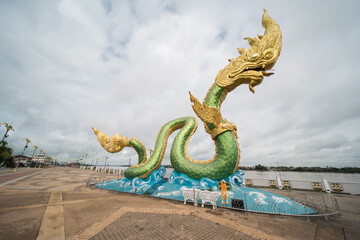 The Naga Statue in Nong Khai, Thailand. the landmark of the town at the mekong promenade.
