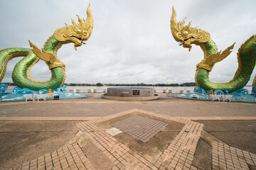 The Naga Statue in Nong Khai, Thailand. the landmark of the town at the mekong promenade.
