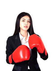 beautiful Asian business young woman  Wearing a boxing glove in hand and business suit , Winning success business woman concept