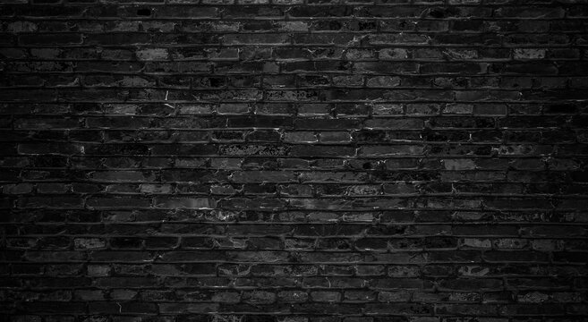 Dark black brick walls, brick room, interior texture, wall background.