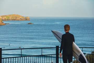surfer looking at the waves