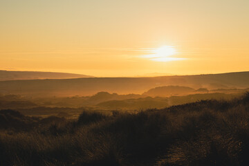 sunrise over the sand dunes