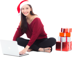 Young woman wear santa hat and gift box sitting labtop with internet shopping in season christmas holiday, girl shoping online on notebook in xmas, celebration concept.