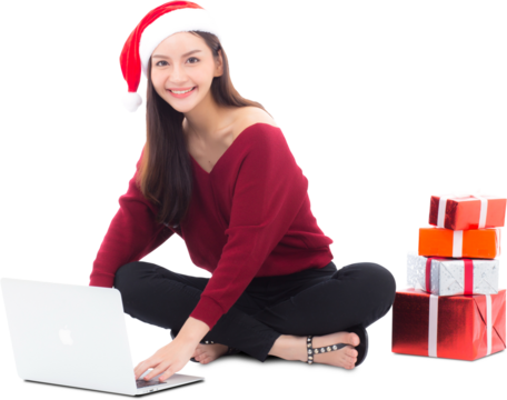 Young woman wear santa hat and gift box sitting labtop with internet shopping in season christmas holiday, girl shoping online on notebook in xmas, celebration concept.