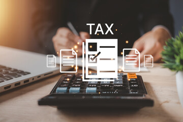 Individual income tax paid and corporations concept. Businessman using a calculator and laptop (notebook) of Data analysis, Paperwork, financial research, and report. - obrazy, fototapety, plakaty