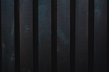 Naklejka premium Brown wood fence texture. Premium colorful abstract background with dynamic shadow on background, wood fence in the dark, gradient color, artistic texture, epic background, beautiful