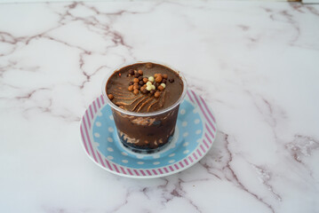 chocolate pudding dessert on glass