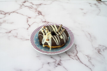 chocolate donuts on a plate