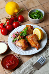 Grilled chicken kebab with vegetables and greens