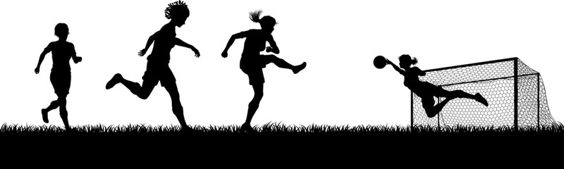 Women players footballers in silhouette scene playing a soccer or football match on a pitch