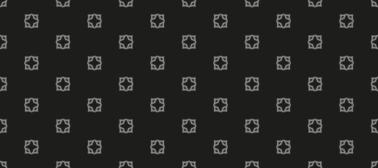 Simple seamless pattern with decorative elements on a black background