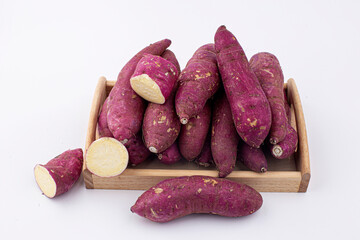 A sweet potato placed on a white background.
