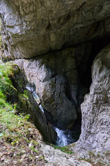 Fototapeta na wymiar Waterfall in a cave