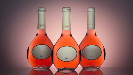 Bottles with rose wine on a pink background. Isolated bottles of wine, front view. Mock up for...