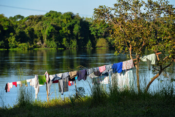 A clothes line on the banks of the Guaporé - Itenez river in the small, remote village of...