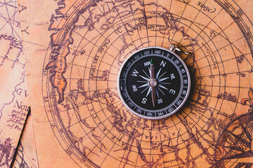 Naklejka na ściany i meble Looking for adventure. Compass and maps. Treasure map and path to the treasure.