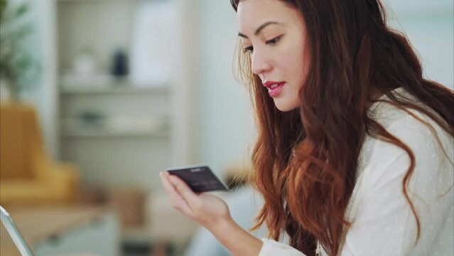 Laptop, credit card and online shopping with a woman customer making a payment for a purchase from her home. Ecommerce, computer and retail with a female shopper buying or spending on the internet
