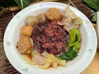 Brown rices, meat ball and yulk with red sauce