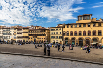 Fototapeta na wymiar Florence, Italy. Tourists in the picturesque medieval Pitti Square