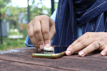 women cleaning mobile phone display for preventing virus 