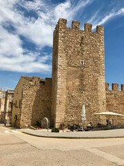 Fototapeta na wymiar Montblanc, Spain, June 2019 - A castle on top of a stone building