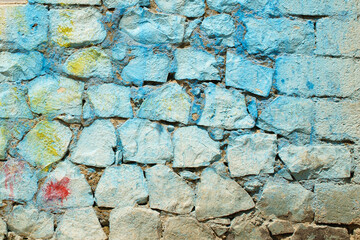 stone wall background, blue color bpburnt stone wall