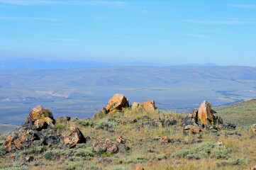 Rocky Hillside with Valley Background