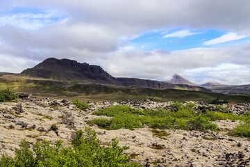 Unreal volcanic landscape in Iceland with steaming rocks on the Grabok volcano.